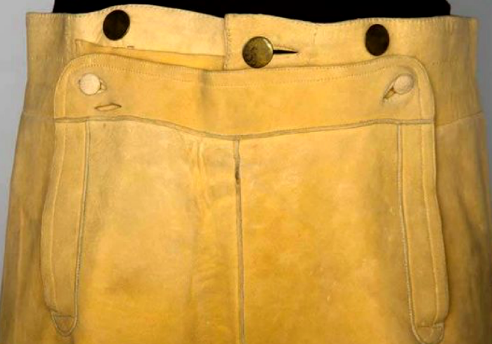 1790 Front Waist View. British Consul's Tan Leather Pants, Boston. Tan buckskin, fall front, brass and self covered buttons, breeches have leather ties at waist and at leg hems. via Augusta Auction
