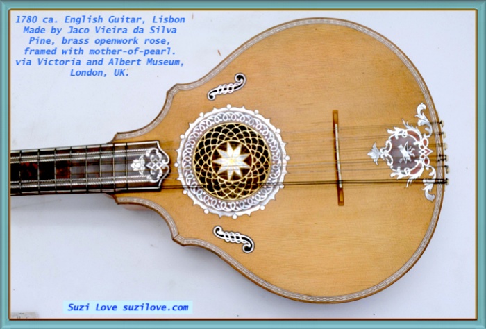 1780 ca. English Guitar, Lisbon, Portugal. Made by Jaco Vieira da Silva Pine back, sides and soundboards, with pine and wood purfling (bordering); brass openwork rose, framed with mother-of-pearl. The English guitar was a fashionable instrument from about 1750, considered easy to play and tuned in C major, although the player would use a capo, much like a modern folk-guitarist, in order to change the key. The tuning pegs were often small metallic pins that could be turned with a watch-key, to keep the strings in tune longer. This instrument was made in Portugal, a country with strong trading links with England, and its peg box is decorated with a paper ‘cameo’ in imitation of a jasper ware medallion, a motif made popular by Josiah Wedgwood (1730-1795) from about 1770. Victoria and Albert Museum, London, U.K.